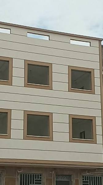 Façade de bâtiment avec finition en pasta espagnole